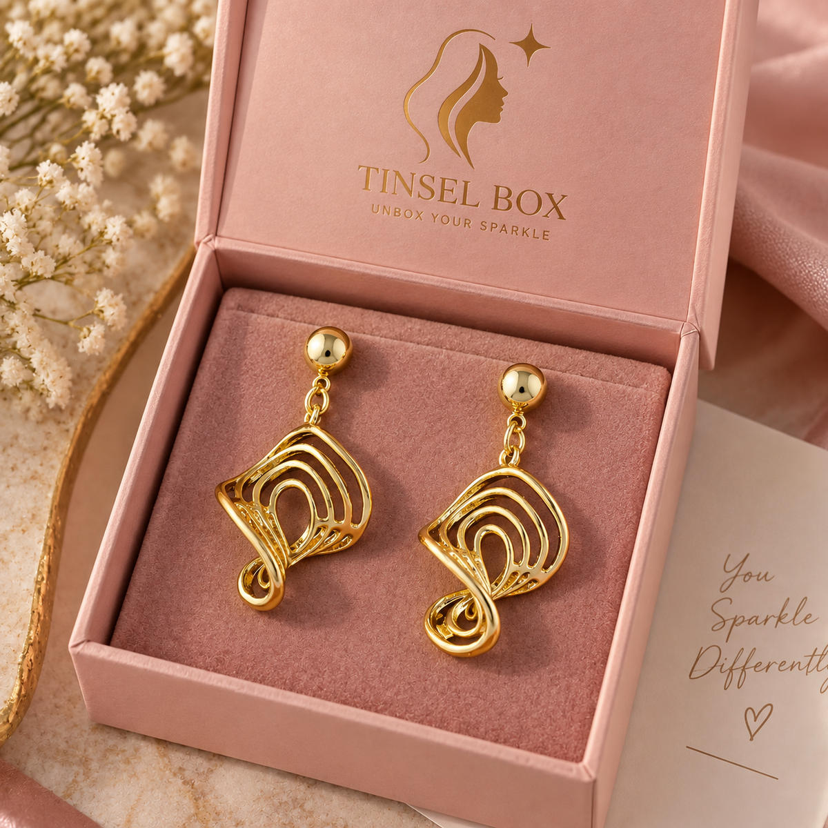 golden swirl studs